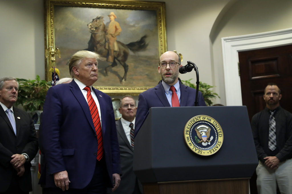 President Trump standing beside Russ Vought in the Oval Office